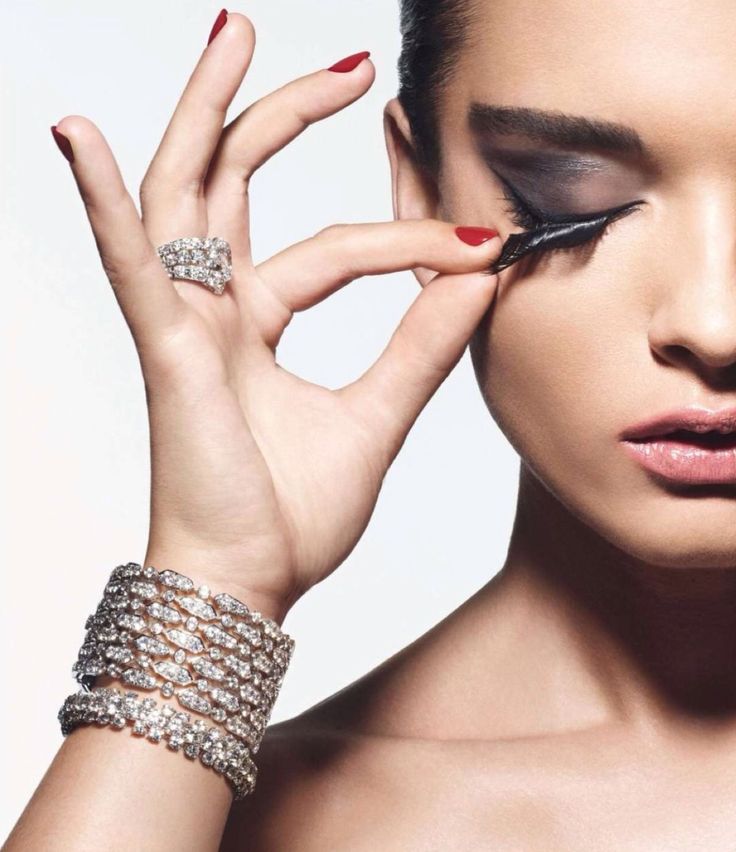 woman Touching Lashes with hands